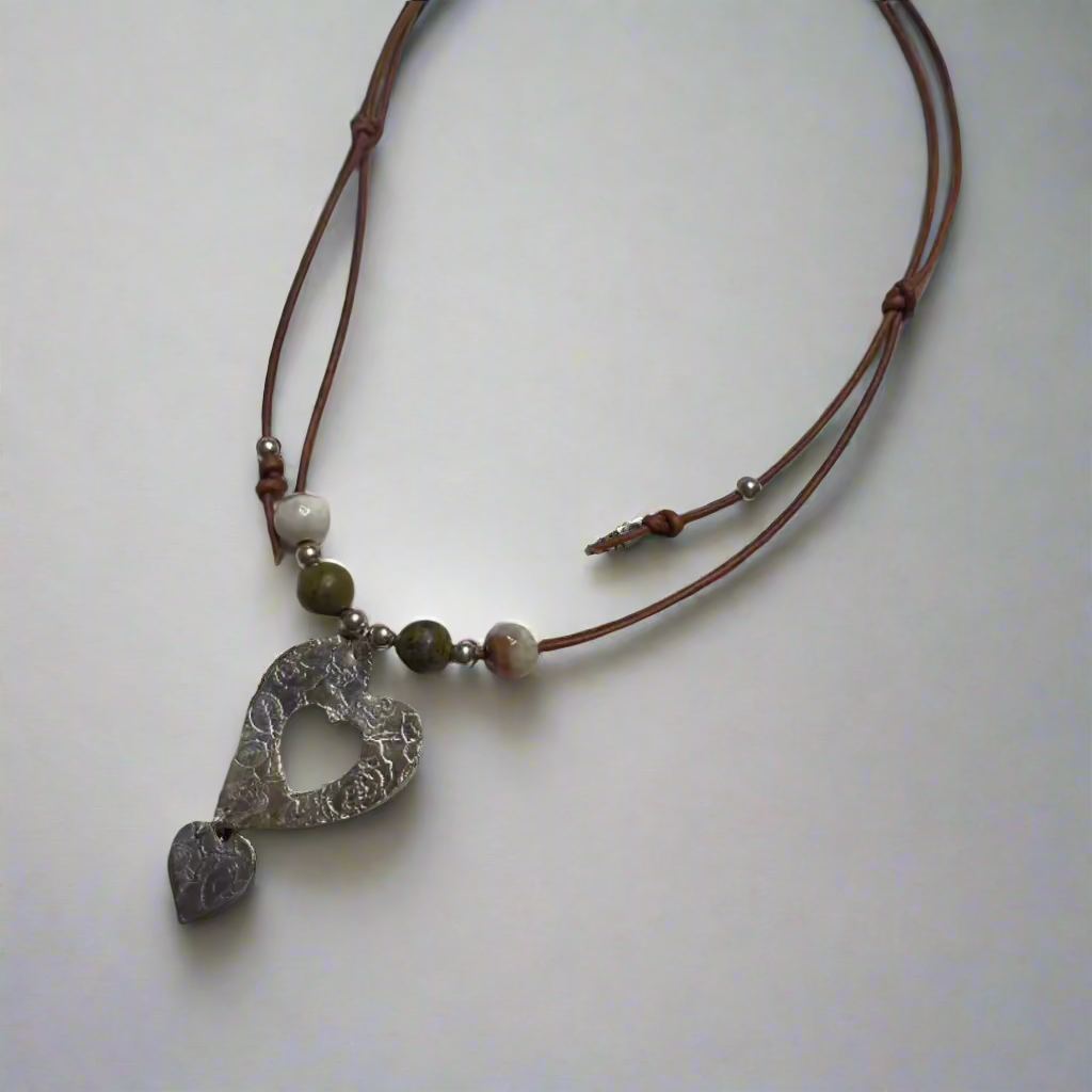 Fine Silver Heart Shaped Pendant with Agate beads on a leather cord with silver accents.