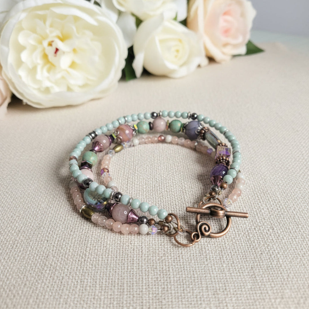Multicolored beaded bracelet on a textured surface