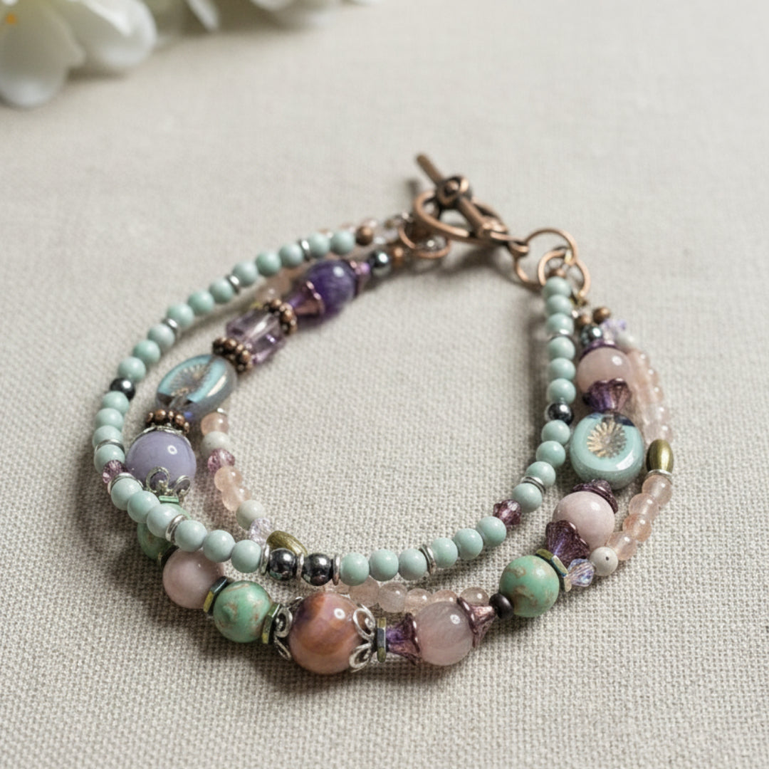 Multicolored beaded bracelet on a textured linen surface